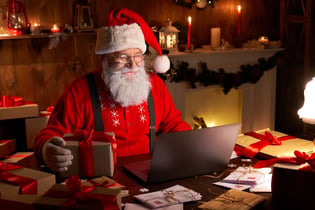 Santa using a laptop
