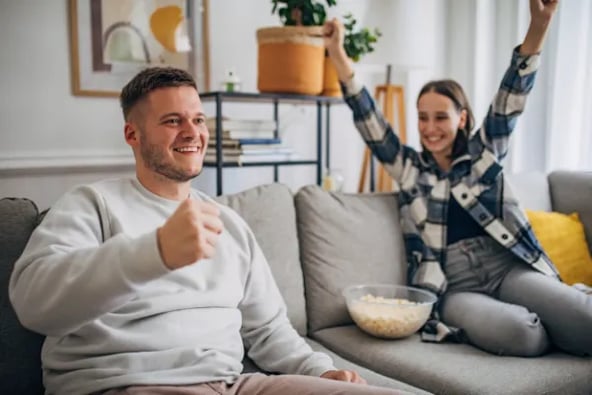 two people cheering