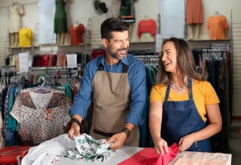 two retail associates working together on a task