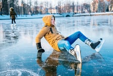 skater fallen on ice