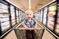 Boy in Shopping Cart