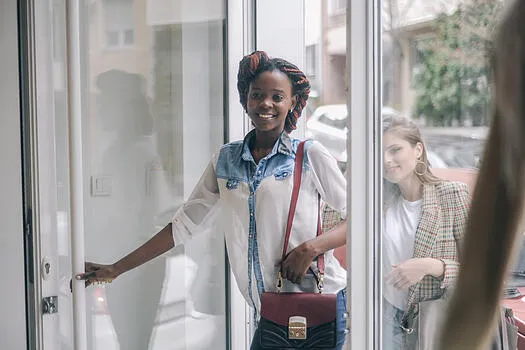 Customers entering retail store