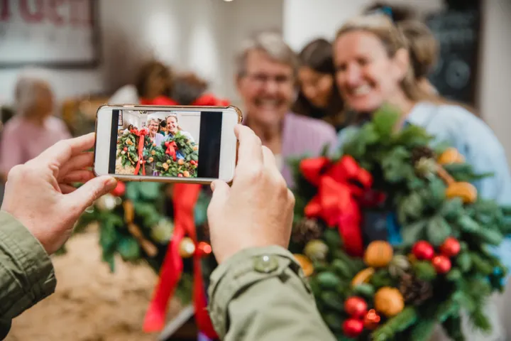 Shoppers taking holiday selfies