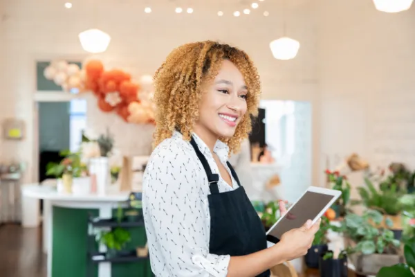smiling retail store employee
