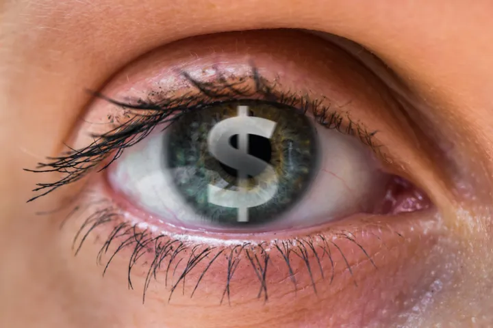Dollar sign in eye